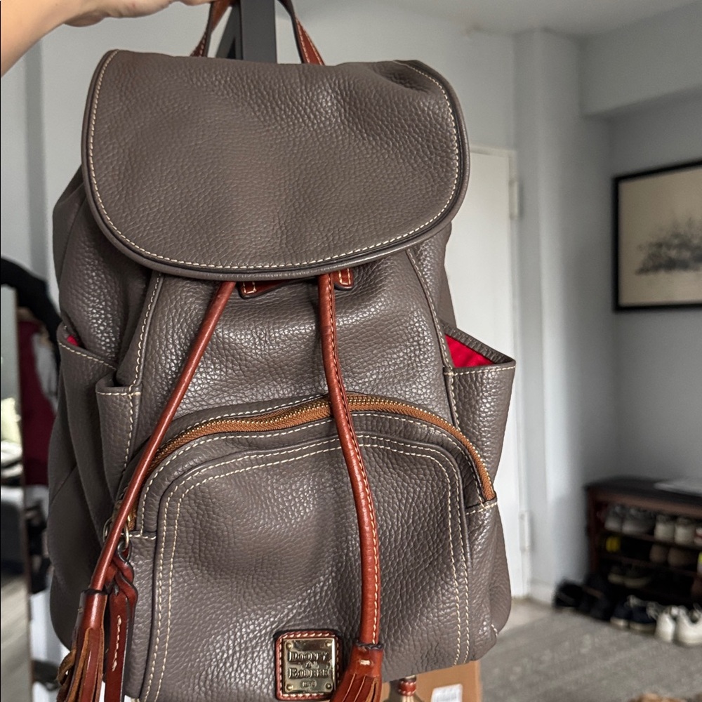Dooney & Bourke Taupe Leather Backpack with Brown Trim and red details